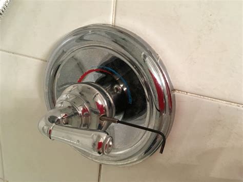 remove moen shower handle|How To Remove Shower Handle Without Screws。